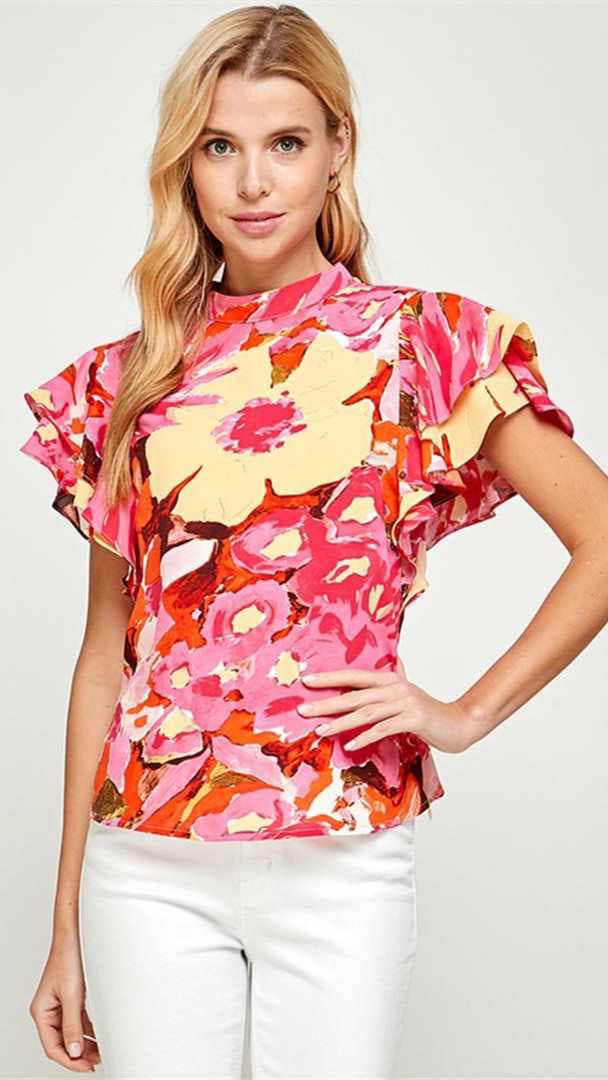 Blusa estampado flora con olan en manga y moño atras del cuello