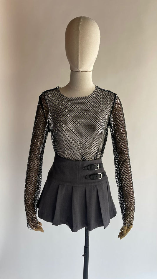 Blusa negra de manga larga transparente