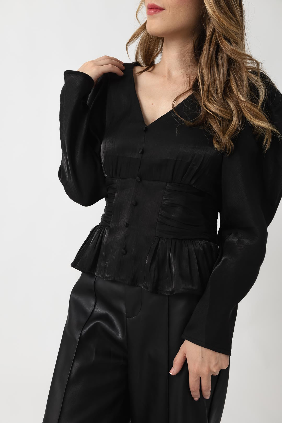 Blusa con peplum manga larga