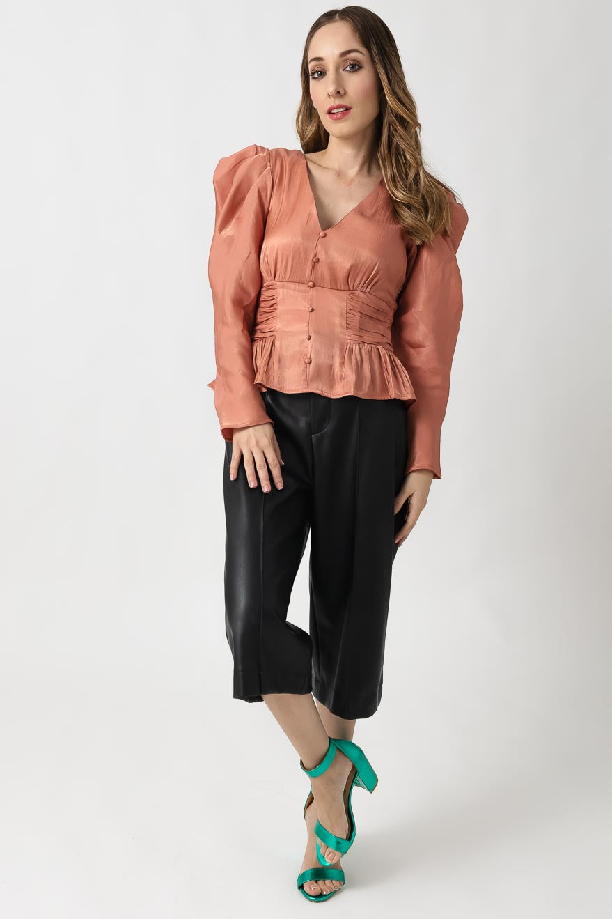 Blusa con peplum manga larga