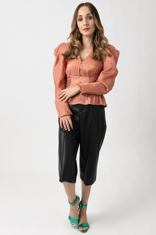 Blusa con peplum manga larga