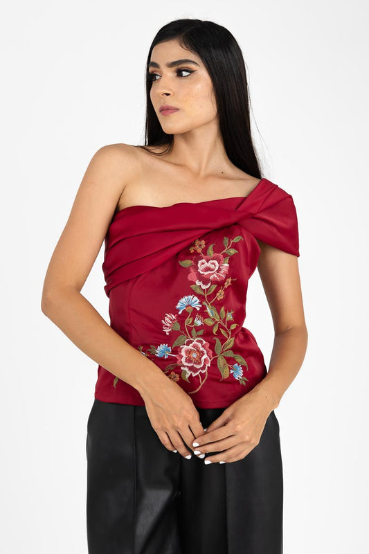 Blusa strapple con moño y bordado al frente