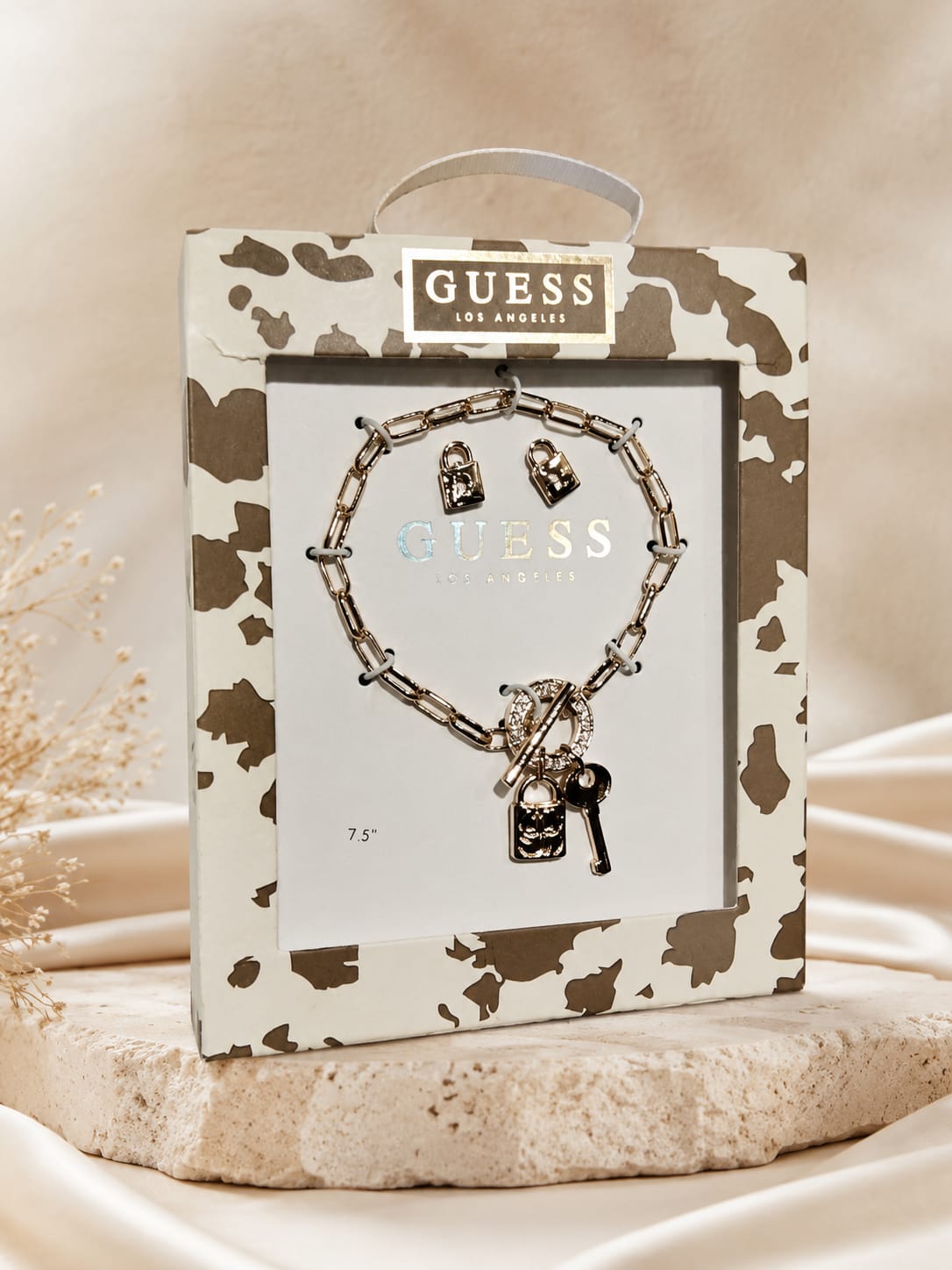 Set Pulcera y Aretes Guess con candado y llave SETGUESS