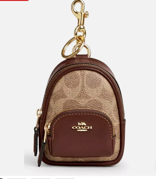 Charms de mochila coach