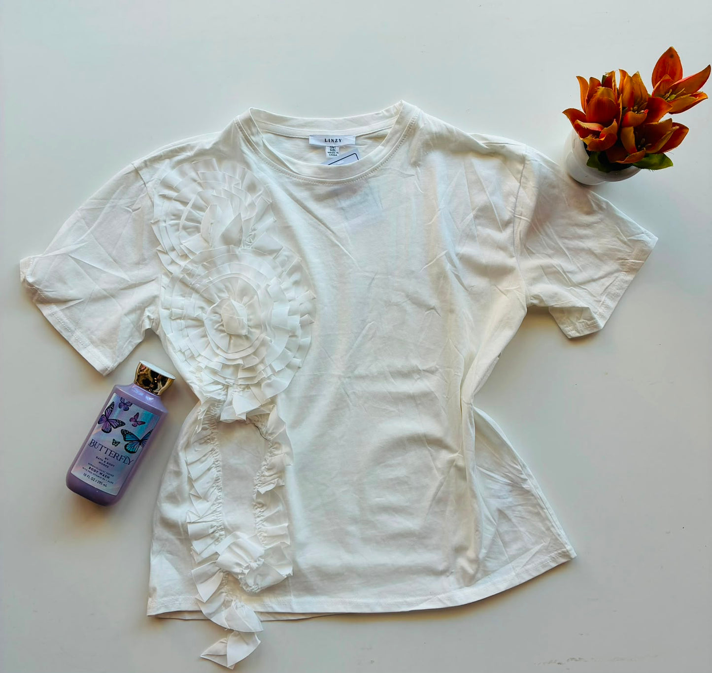 Linzy Playera con flor T5866
