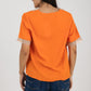 Blusa con cuello v y manga de crochet en beige y naranja