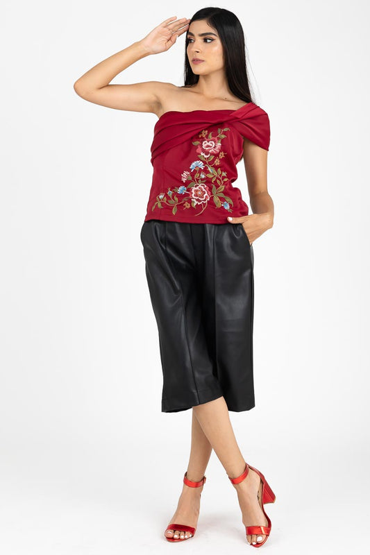 Blusa strapple con moño y bordado al frente