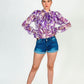 Blusa de manga larga con estampado morado