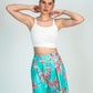 Pantalón pata ancha estampado palmas
