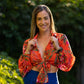 Blusa estampada con nudo al frente